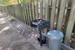 Outdoor grill for guest use