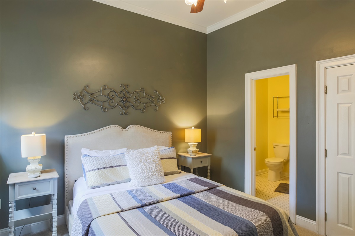 Bright and comfortable, the queen bedroom offers a cozy retreat with its own ensuite bath.