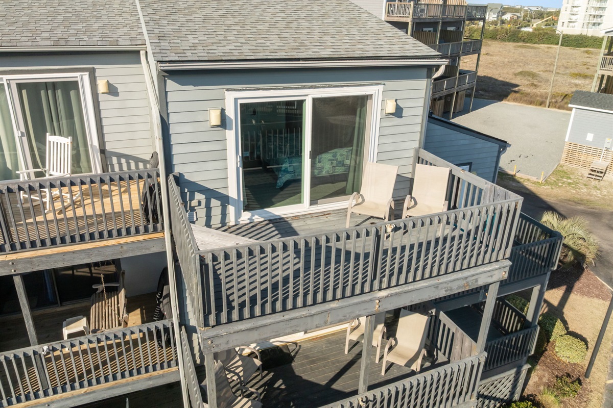Private balcony space perfect for morning coffee or unwinding after a day at the beach