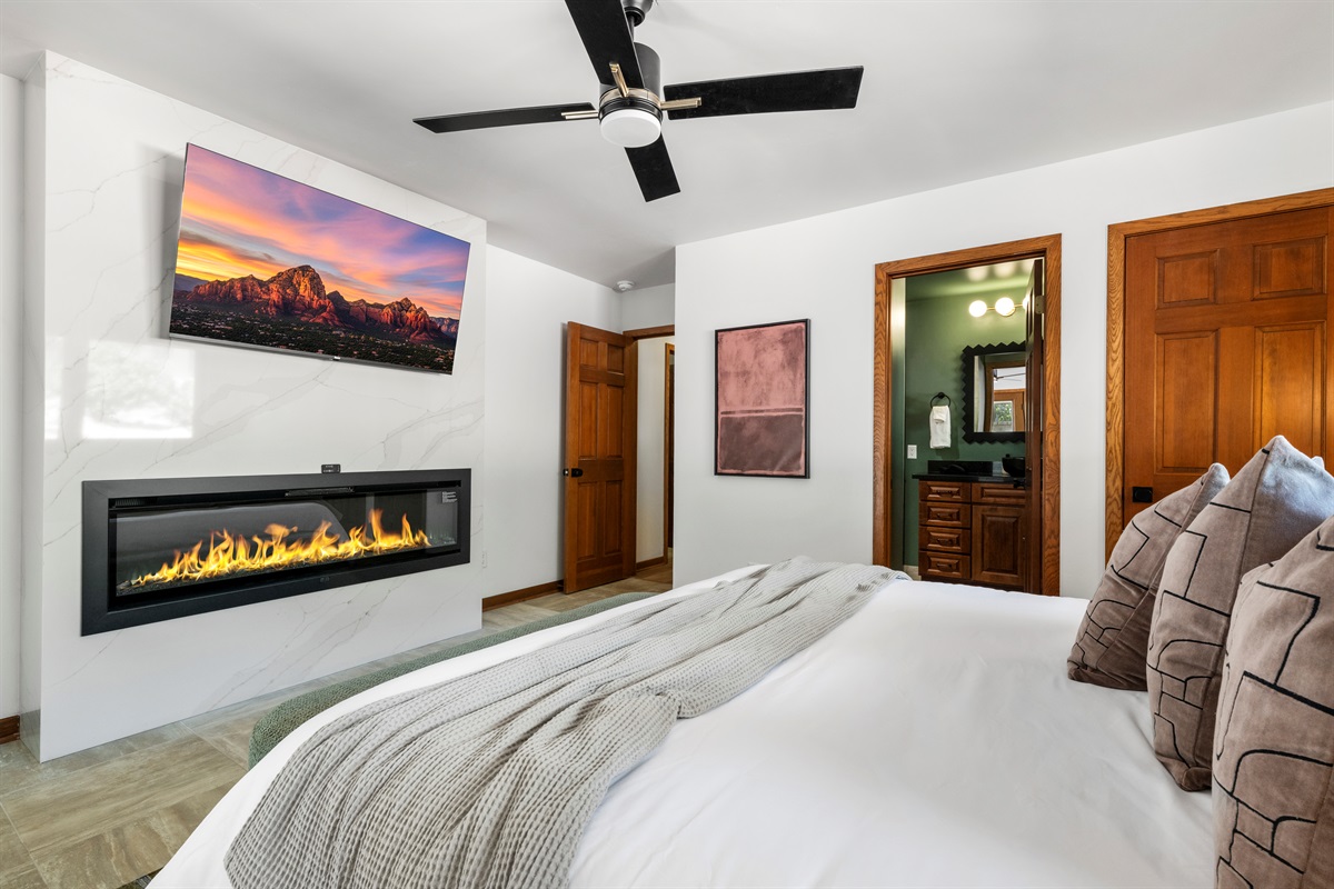 King bedroom 2 with modern fireplace—designed for comfort and ease.