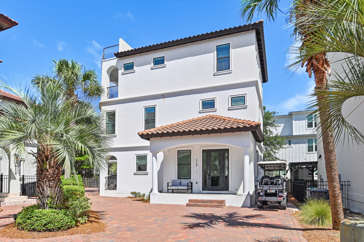 Spacious outdoor area with easy access to the home and golf cart.