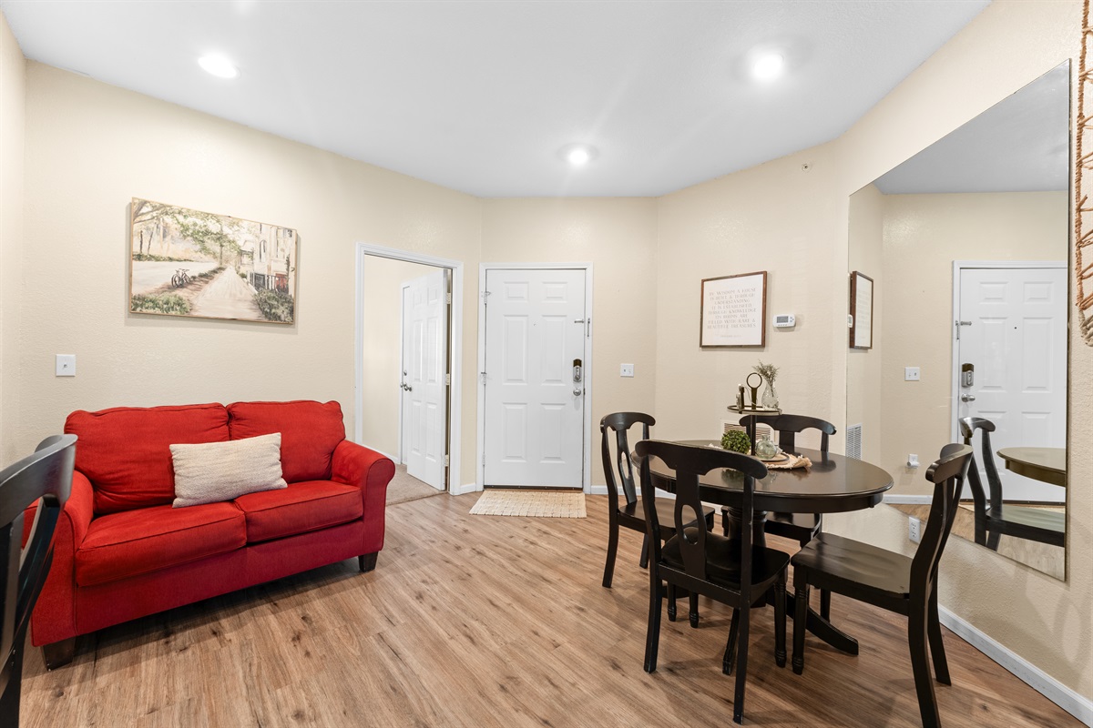 Dining area beside the open-concept living space, so meals and game nights can happen in one shared zone.