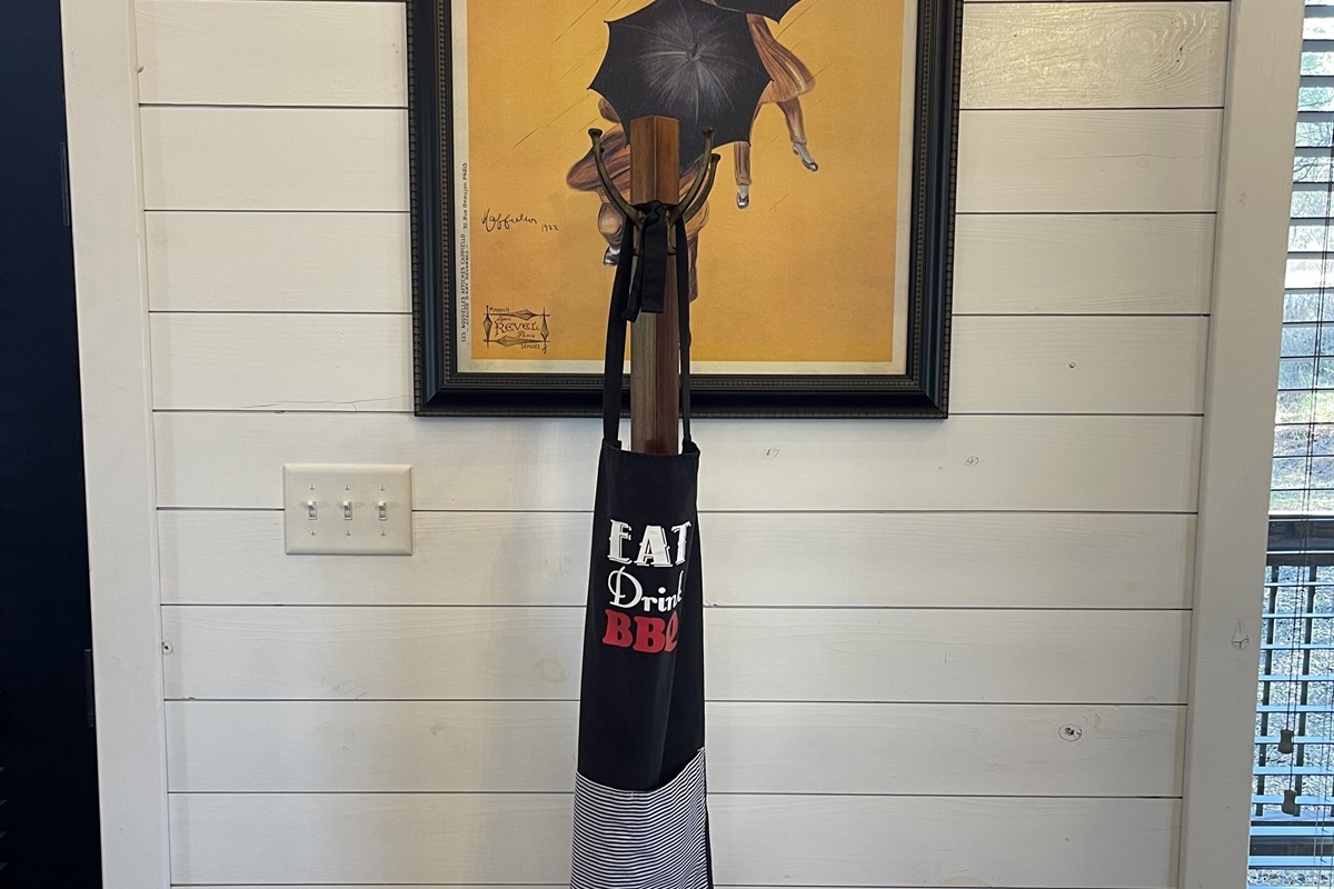 Trendy artwork and a coat rack to hang your coats on - we provide an apron for keeping your clothes clean[er] while you whip up delicious meals.