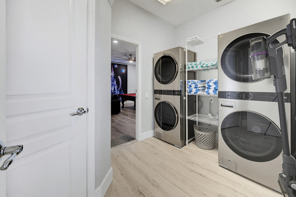 Double pair of washer & dryer and pool towels