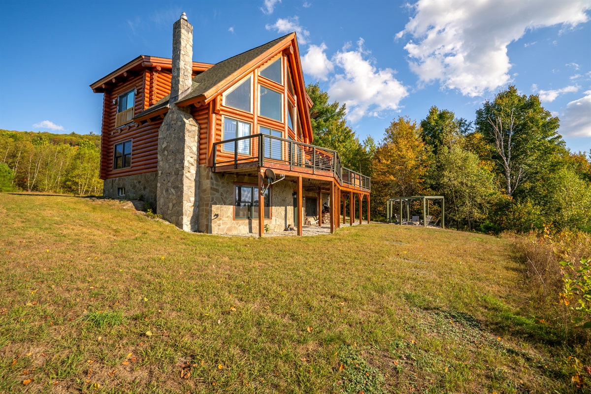 Spacious yard and patio for fun, relaxation, and outdoor enjoyment.