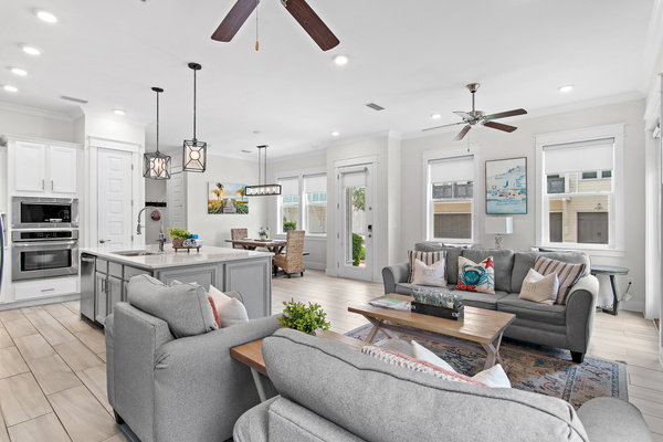 Open-concept living room, kitchen, and dining area, perfectly designed for entertaining and spending time together.
