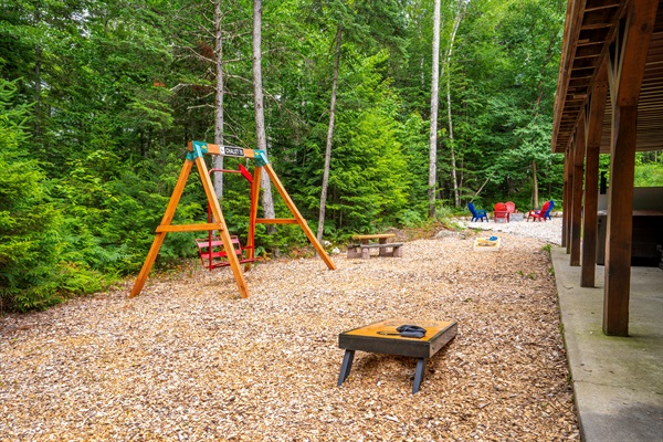 Whether you're young or young at heart, our cornhole game and swing are here for everyone to enjoy!