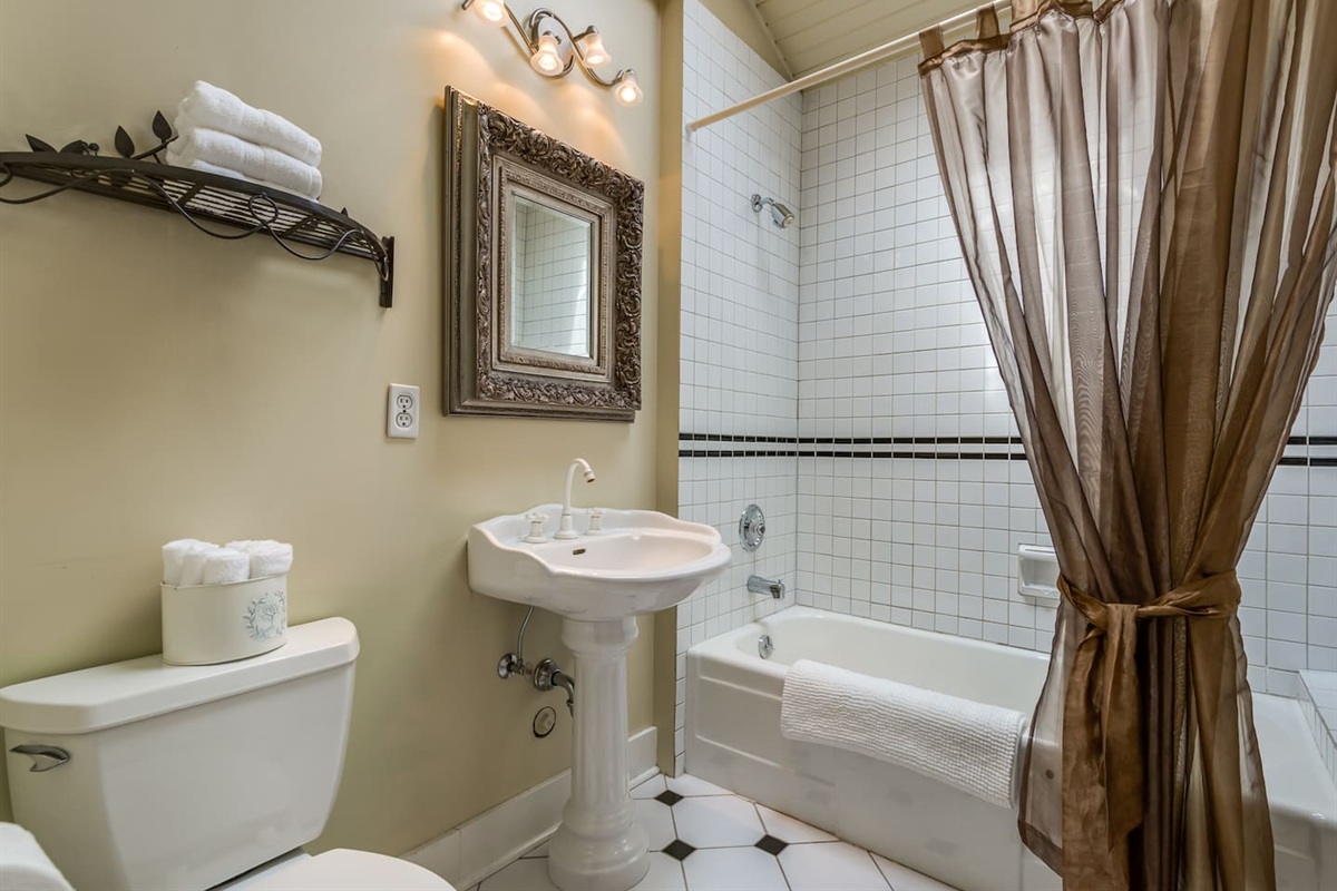 Upstairs bathroom.   Very sweet room with a high skylight - so bright even on the darkest of days.