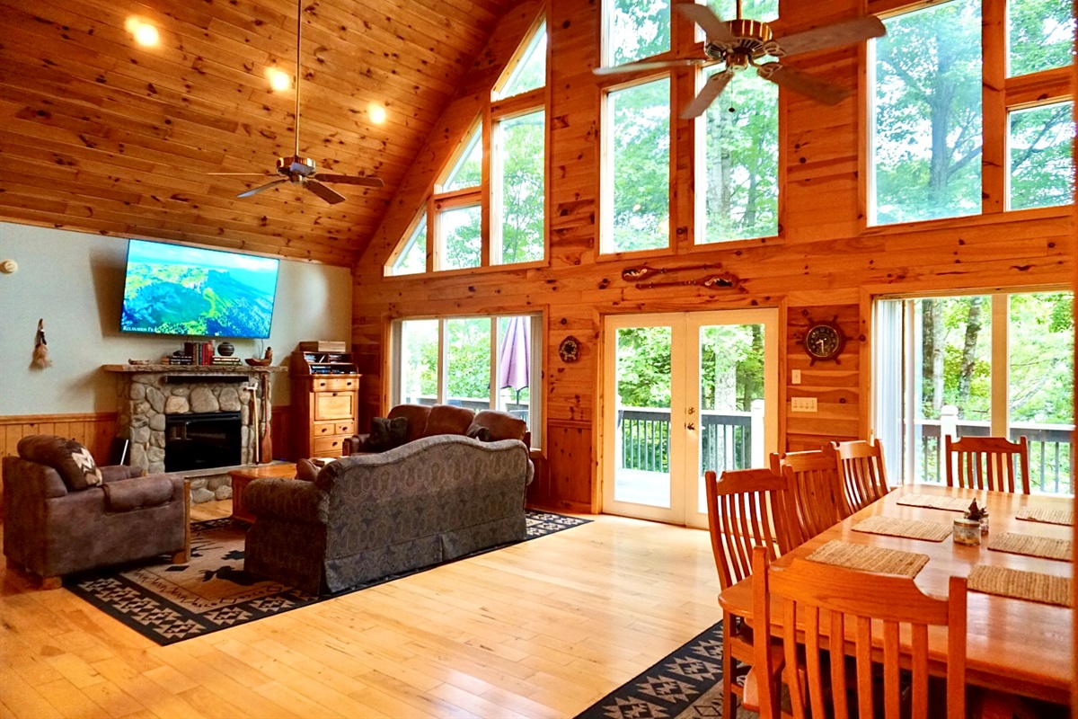 Expansive windows and rustic charm invite you to relax in nature's embrace!