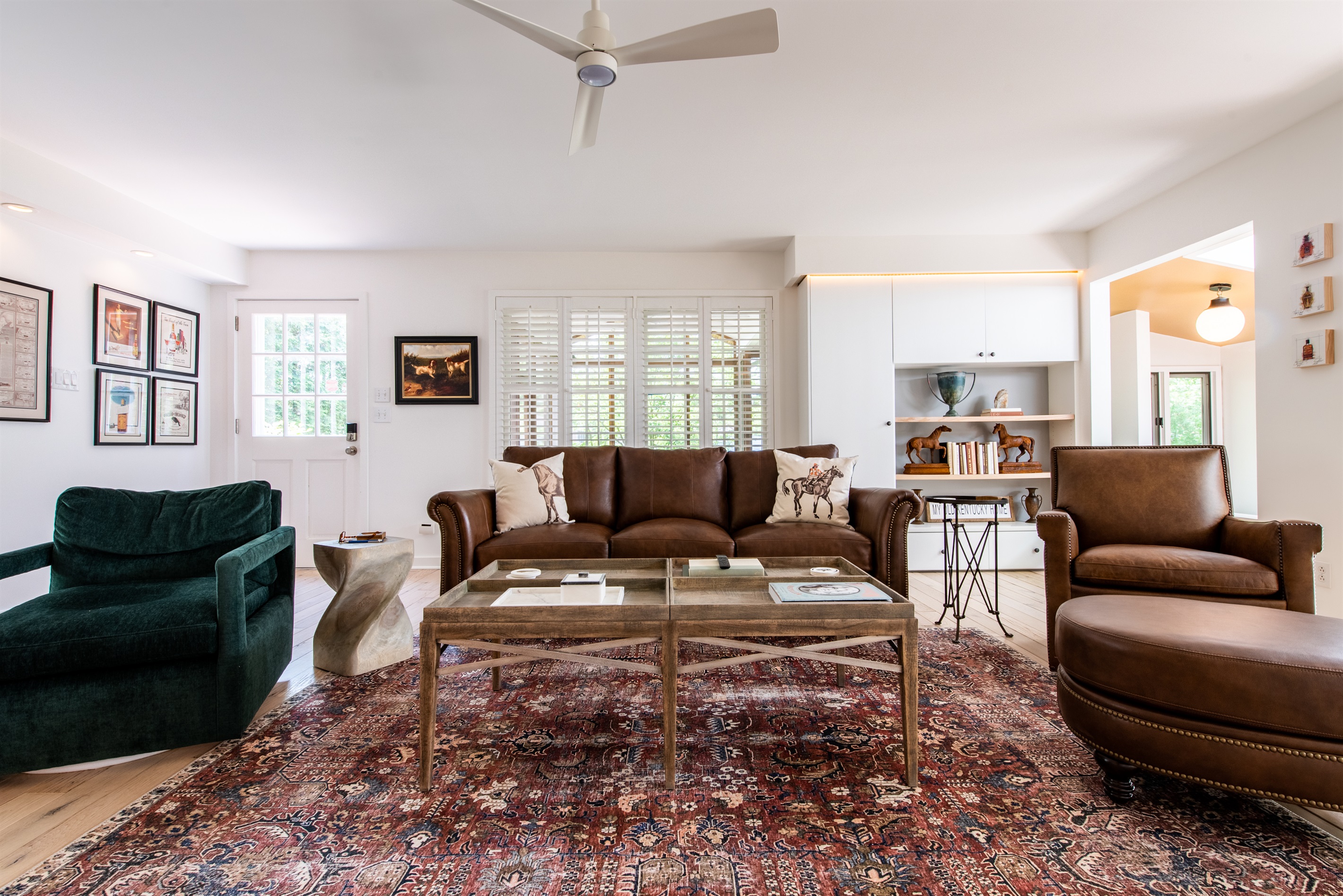 Ceiling fan over a cozy seating area, perfect for relaxing in cool comfort.