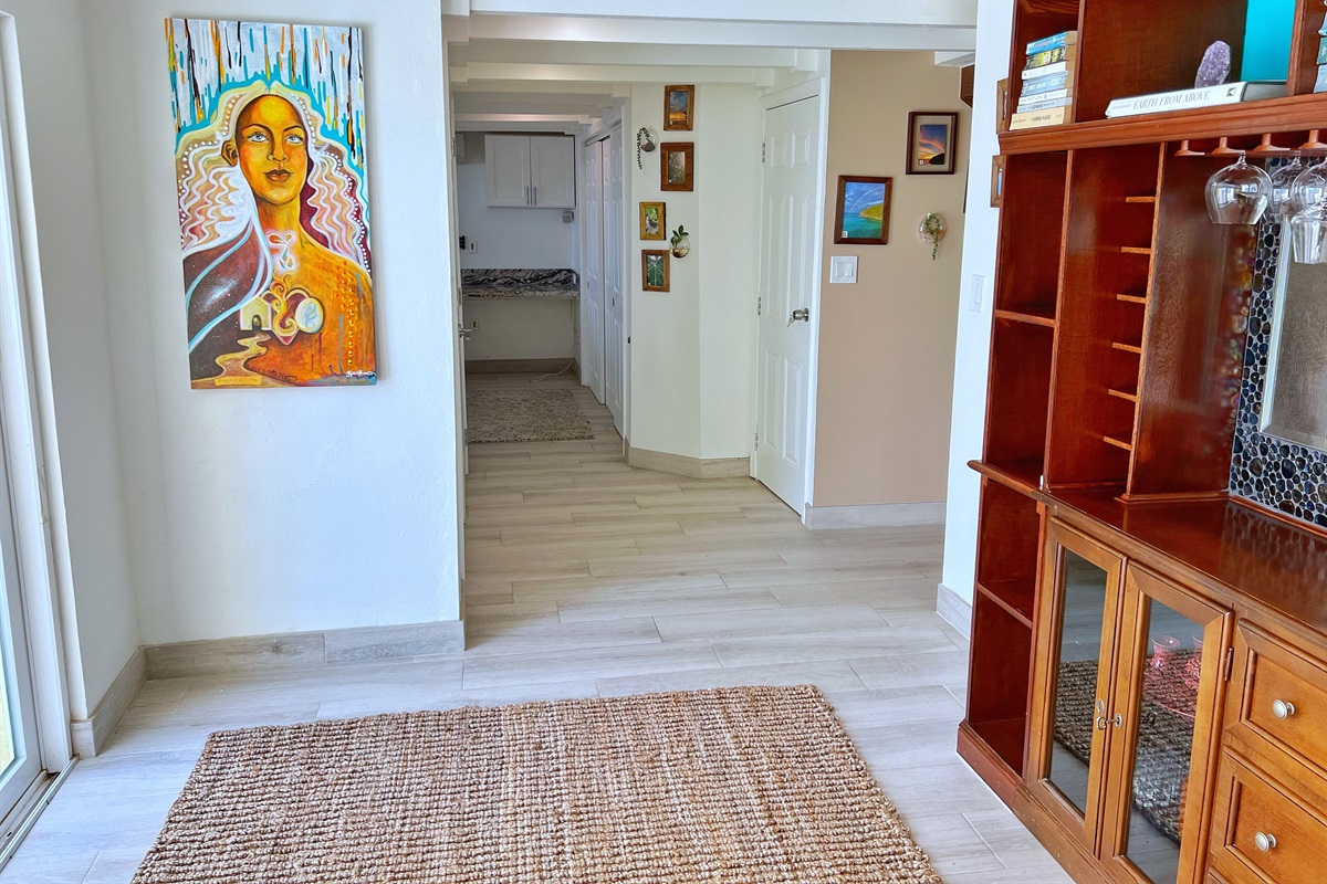 Across from the living room is the kitchen with the desk area.