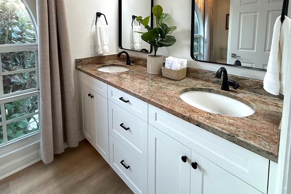 Master 2 En suite double vanity with large window letting in the natural light