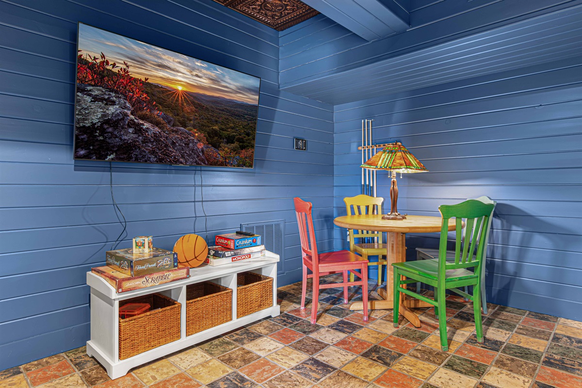 Game Room: Bright colors and fun décor await your laughter-filled game nights!