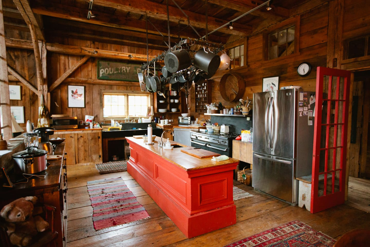 Cook's Kitchen. Old store counter center island, hotel pot rack, a grand antique Julia Child's style stove and awesome slate sink will excite even the most creative cook.