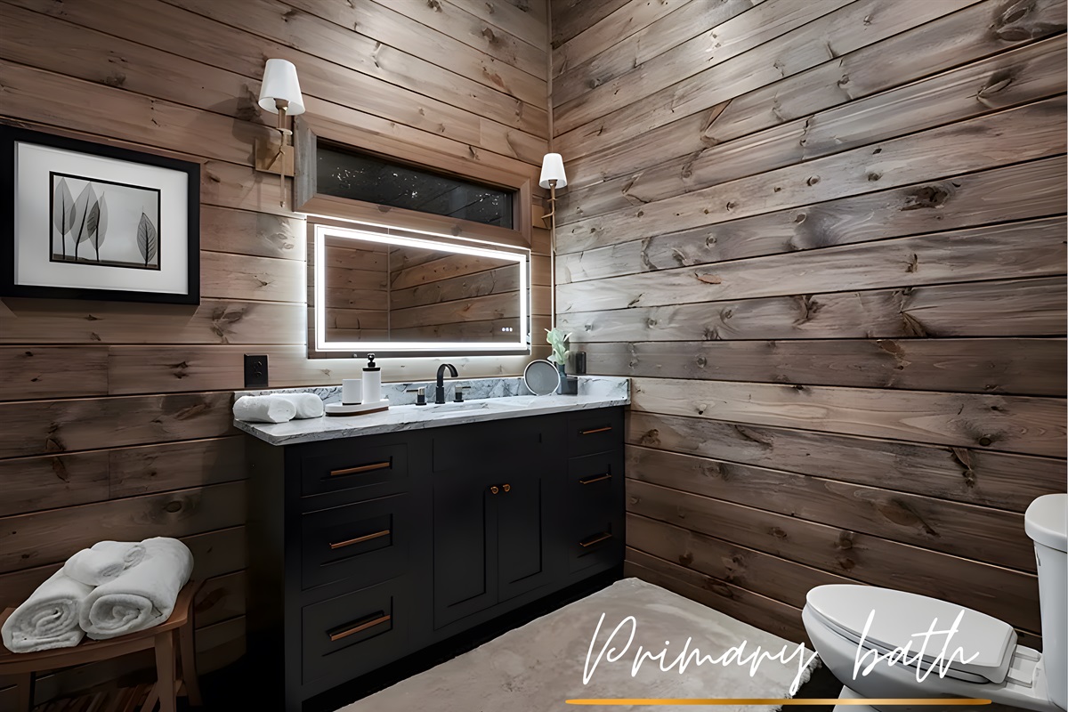 Lighted mirrors + clean lines, elegance at eye level.