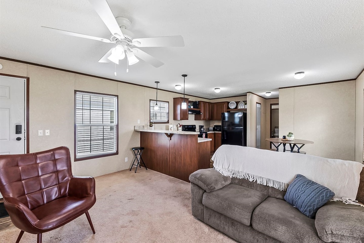 Open-concept living space seamlessly connected to the kitchen—perfect for relaxing or entertaining.