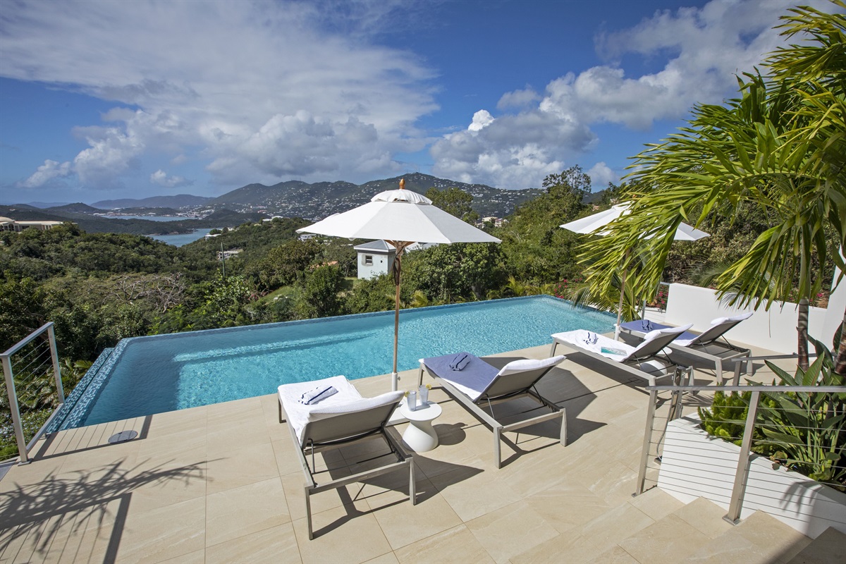 Pool deck with views of surrounding islands, downtown and Havensight