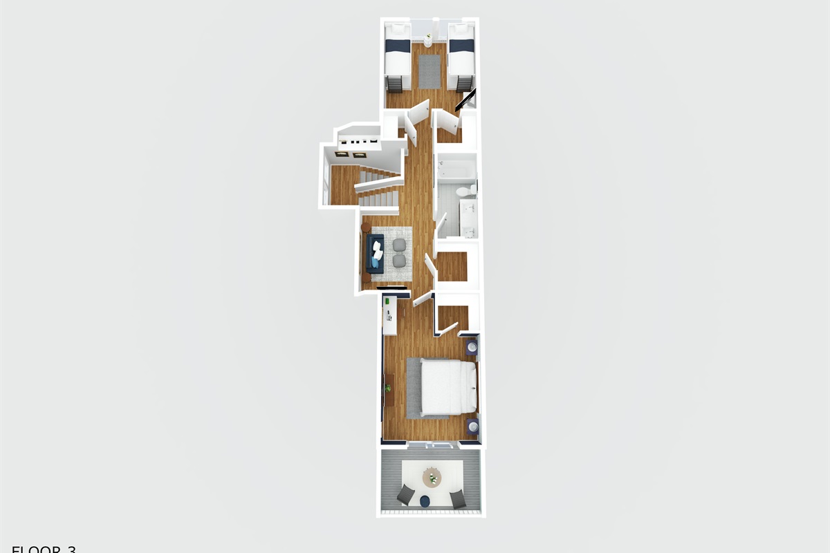 Third floor layout featuring additional bedrooms, including the king suite, bunk room and private balcony.