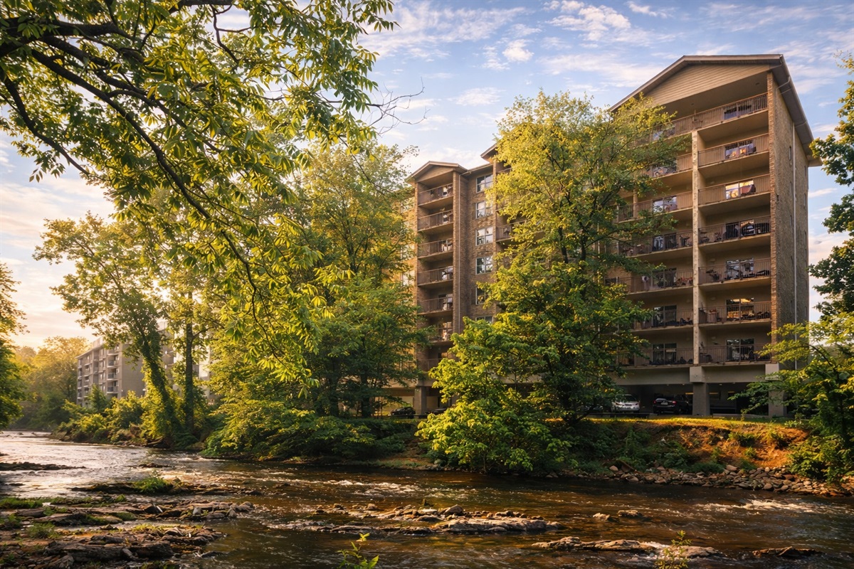Beautiful riverside setting with scenic Smoky Mountain views — experience peaceful Gatlinburg lodging along the water.