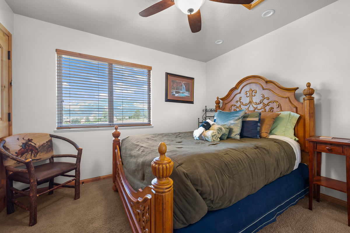 Bedroom 2 is designed for a peaceful night’s sleep. Lovely views out the large window.