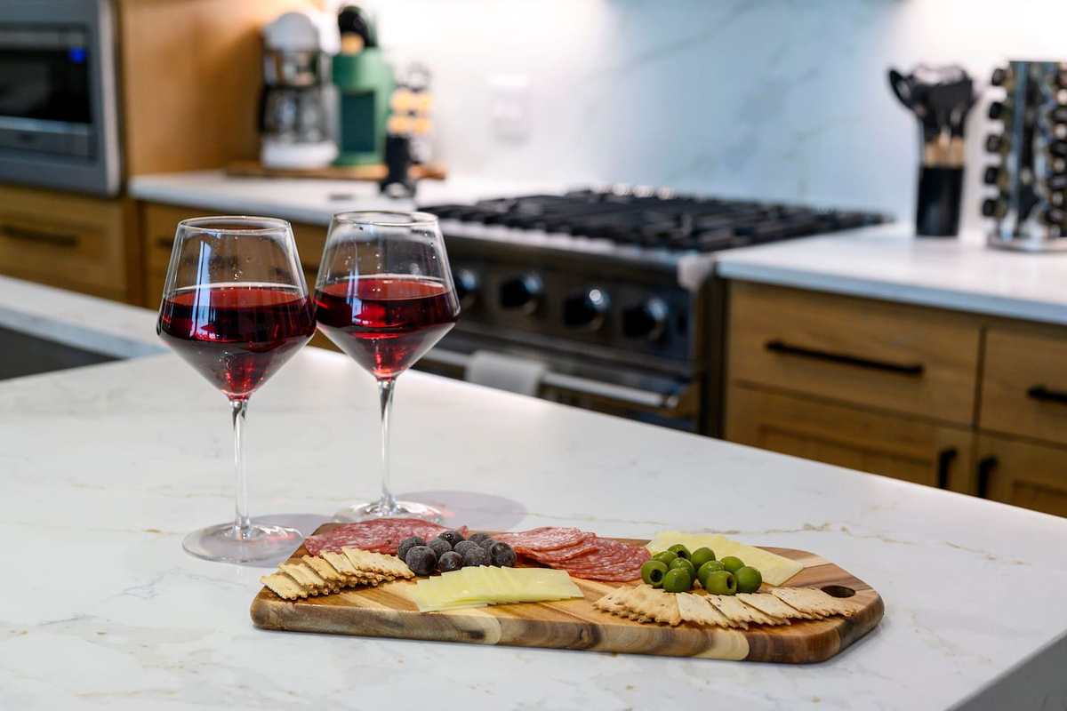 Wine, charcuterie, and a fully equipped kitchen—the perfect setup for slow evenings, good conversation, and a little luxury at Fossil Rock.