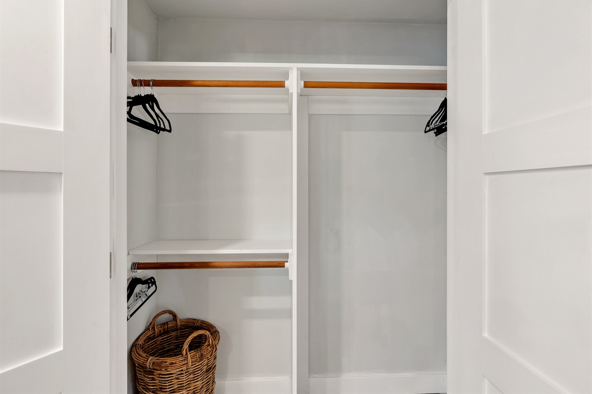 Spacious double closet with ample storage for extended stays.