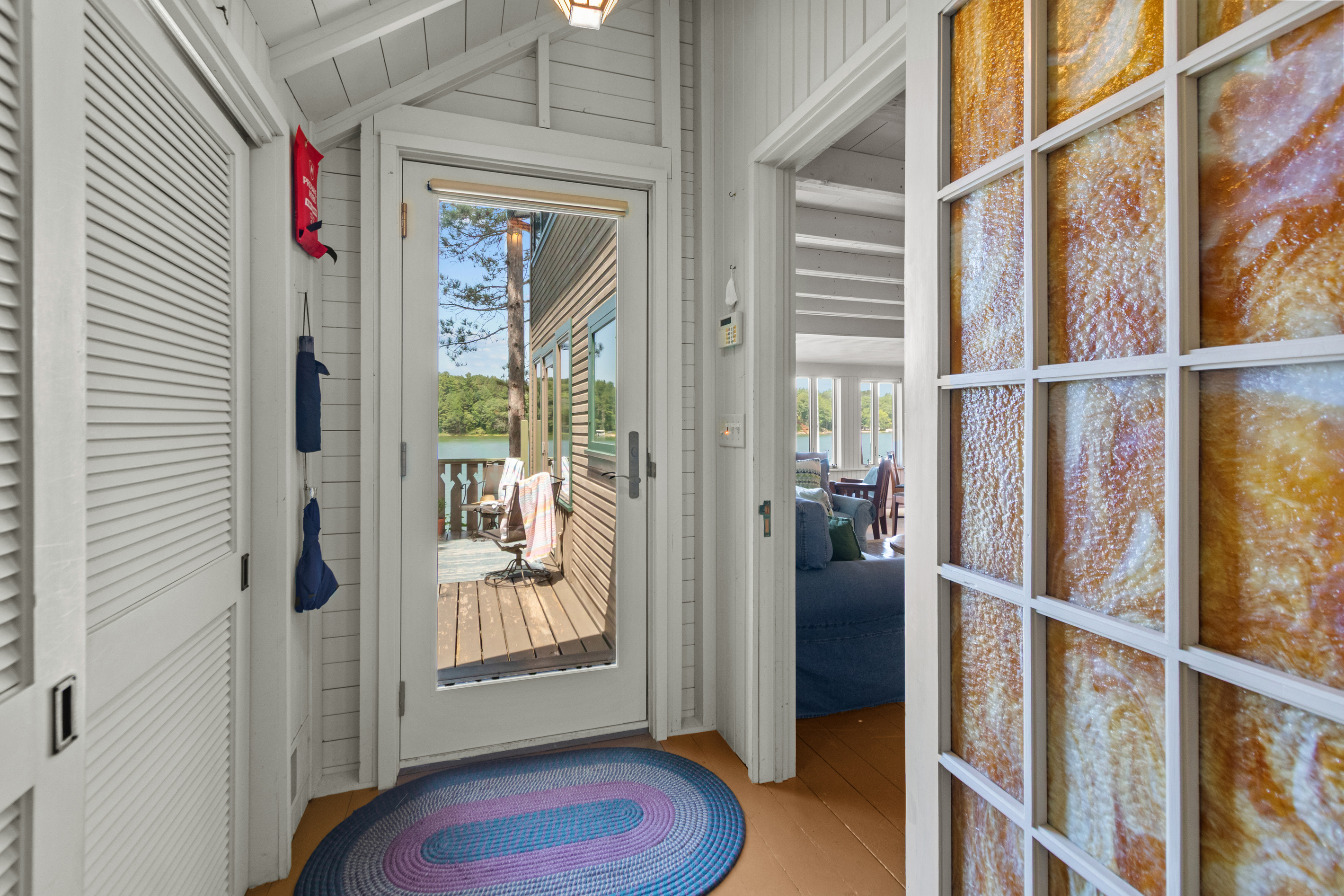 Step through the glass door and onto the deck, where beautiful lake views, fresh air, and peaceful moments are just waiting to be enjoyed.