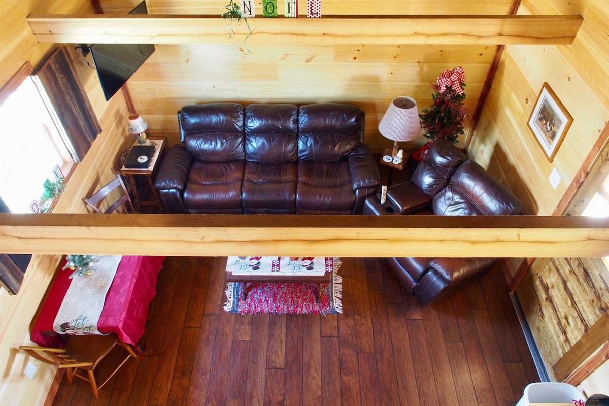 Living Room Area from Open Air Loft. Cabins Have Central Heat and Air Throughout