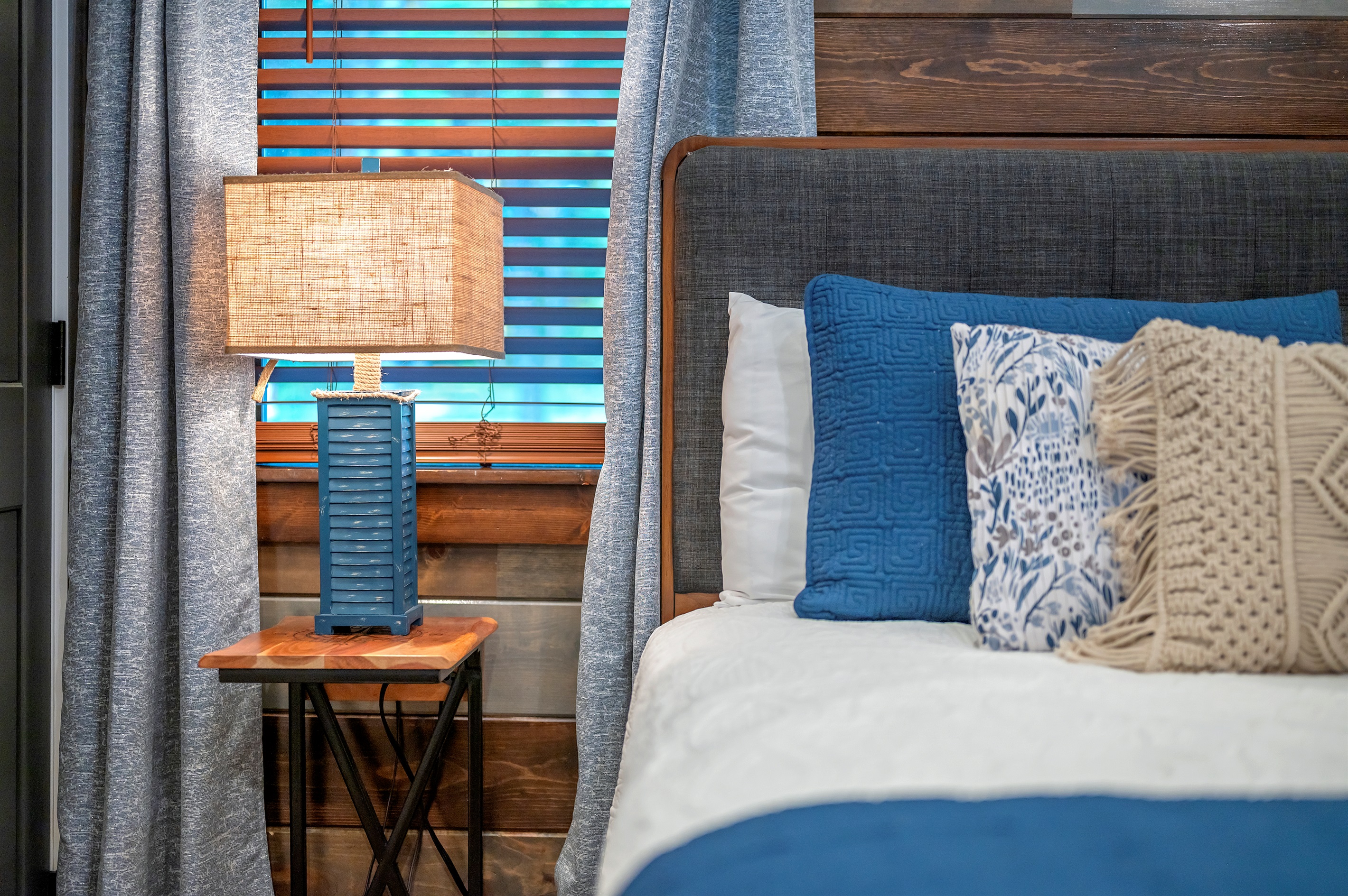 Dual nightstands with lamps. Perfect for placing water bottles and laying your smartphones to sleep.  Phones need a good night's rest also!