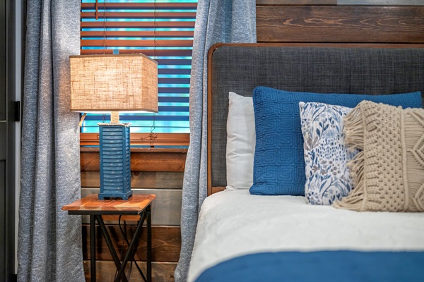 Dual nightstands with lamps. Perfect for placing water bottles and laying your smartphones to sleep.  Phones need a good night's rest also!
