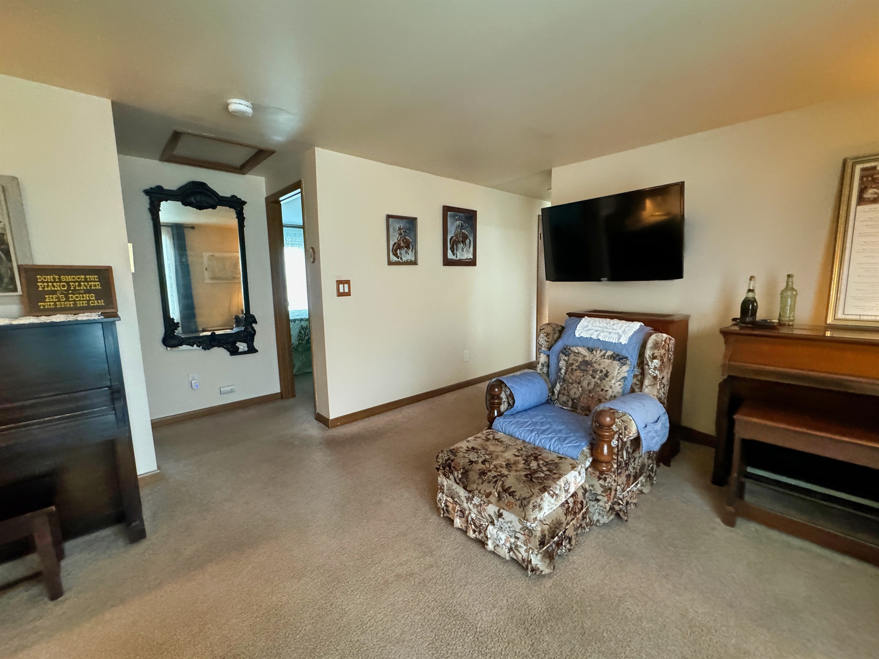 Living room between twin bed room and queen room.