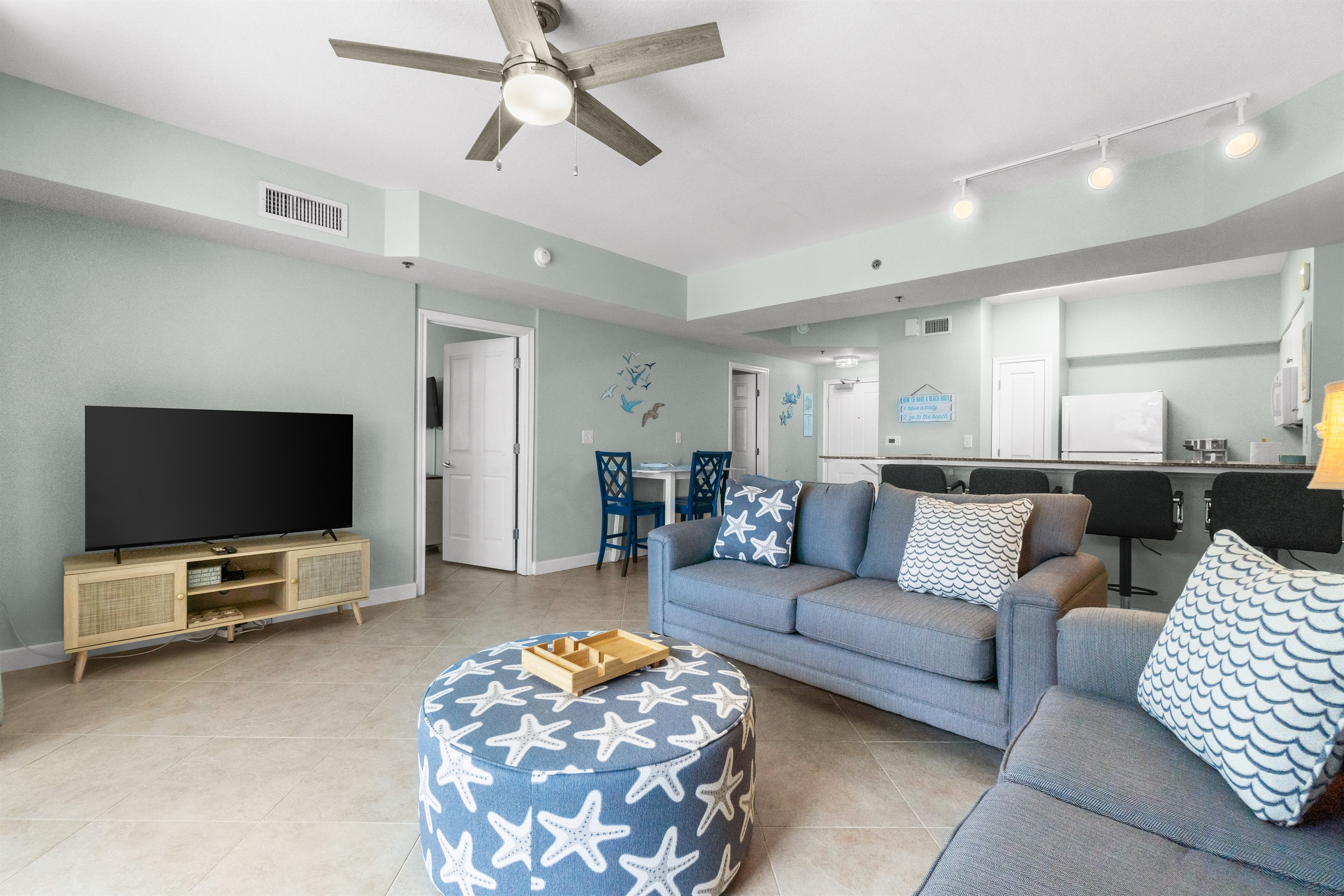 Love all the space in the living room and kitchen area.
