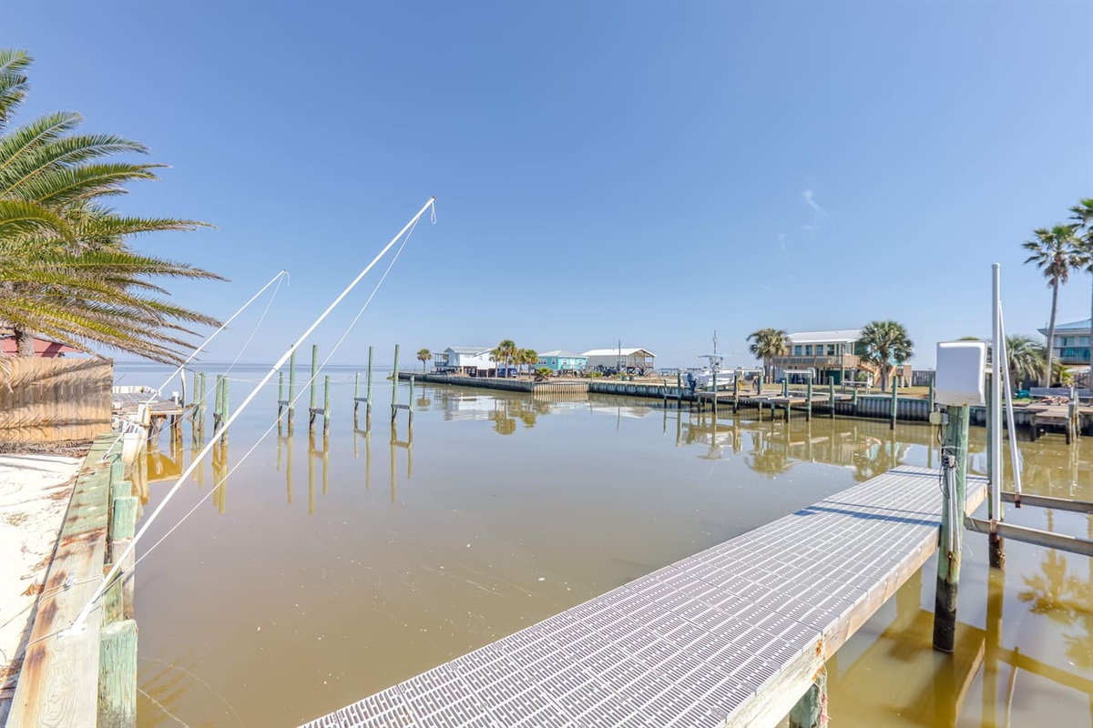 Waterfront Paradise: Relax on the dock while soaking in serene bay views and gentle breezes!