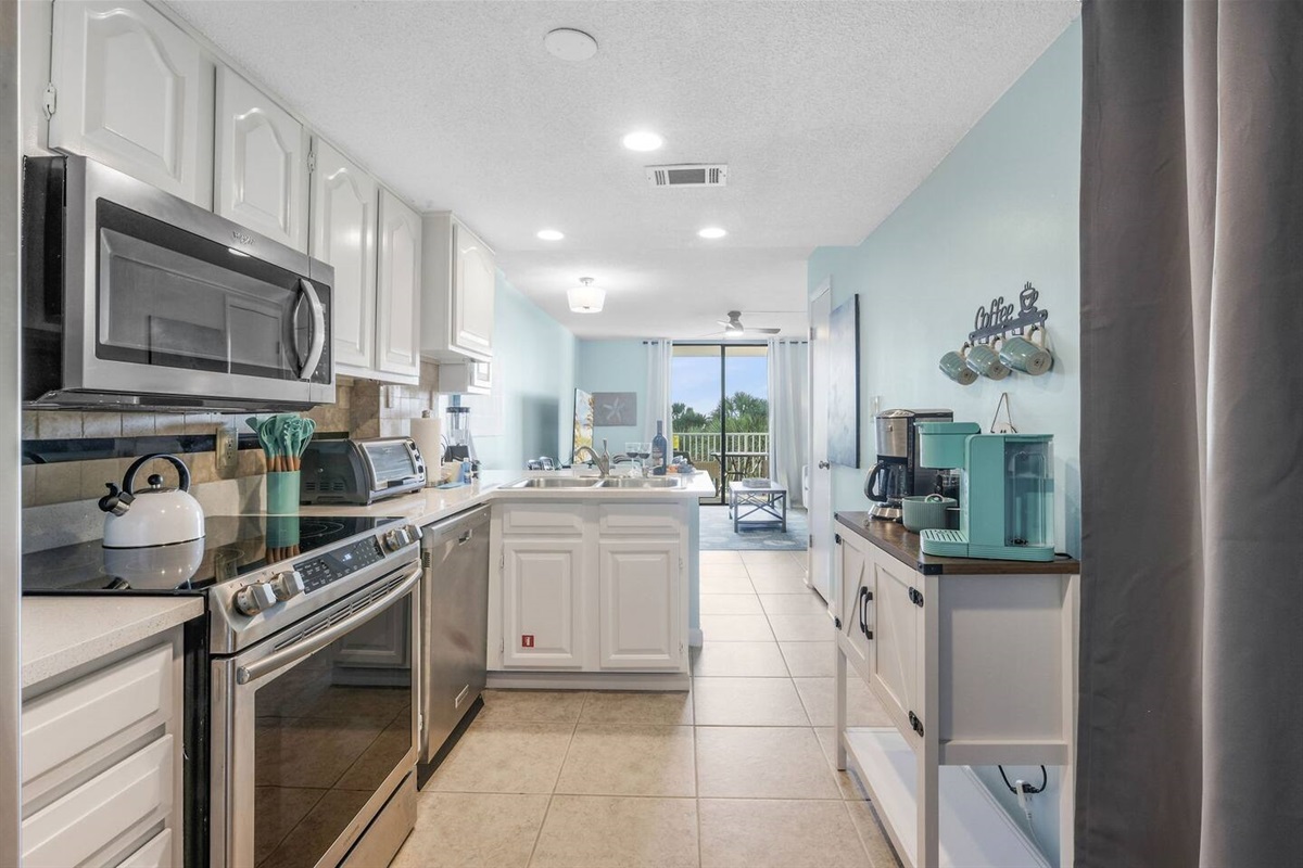 New stainless steal appliances and a pantry with plenty of room for all of your beach snacks!