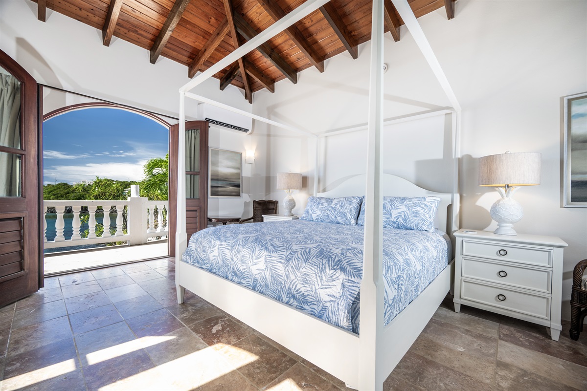 Pool Bedroom 1: Wake up to panoramic views from your luxurious king-sized bed.