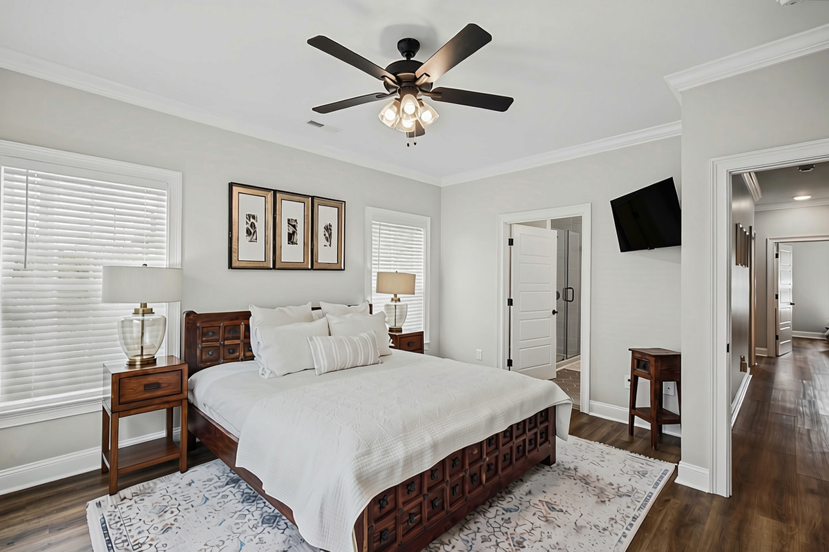 Restful primary bedroom with natural light on both sides