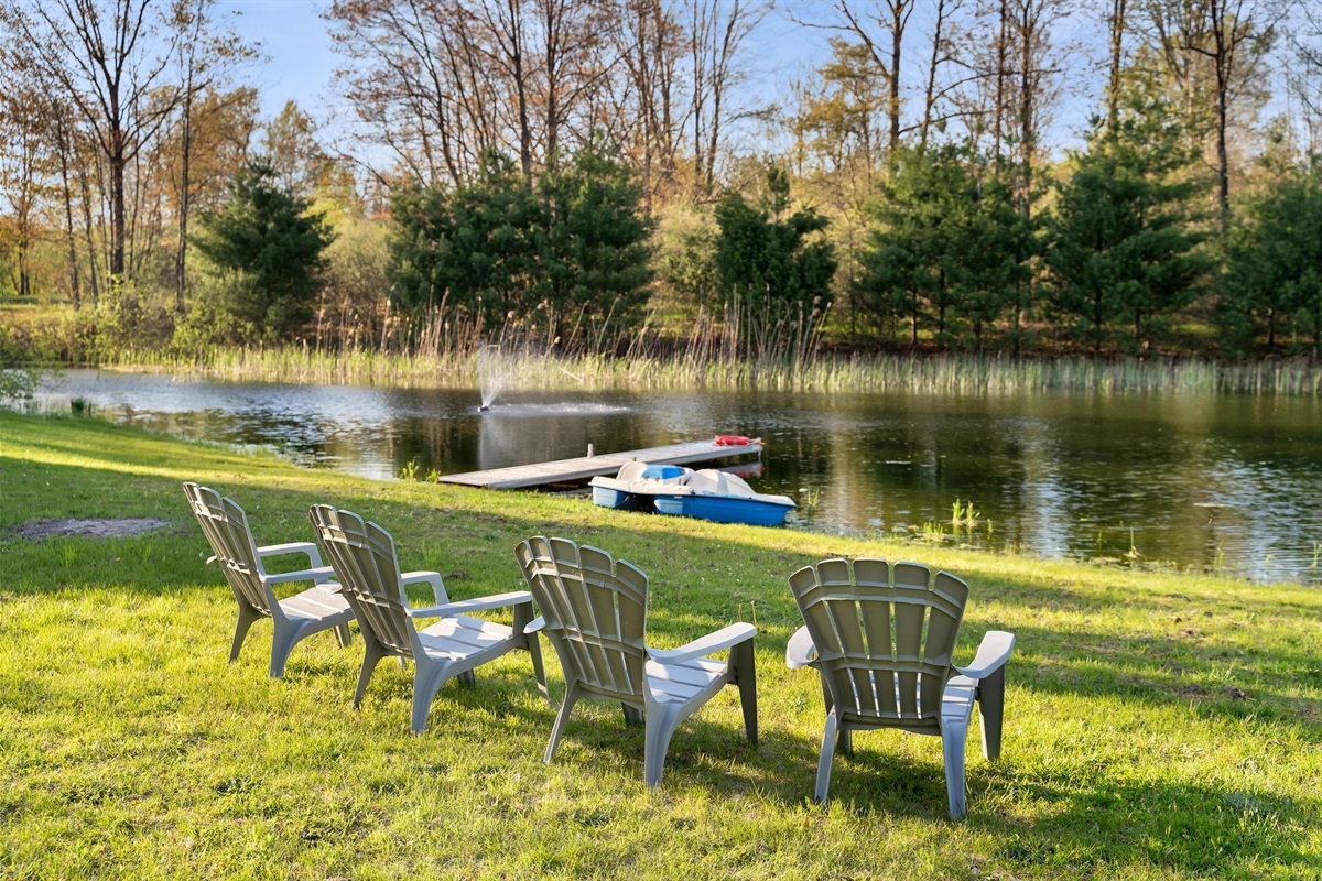 Peaceful pond setting with fountain.