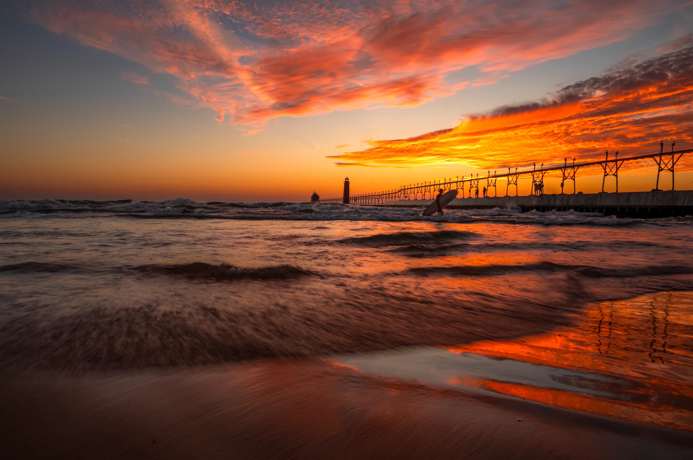 Grand Haven State Park Surfing: Try surfing on Lake Michigan with rentals available downtown