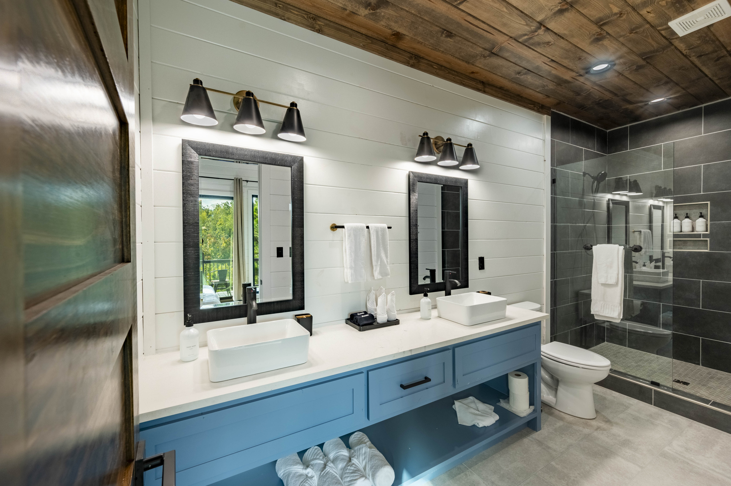 Enjoy spa-like experience in our modern bathroom featuring a spacious double vanity, stylish finishes and thoughtful amenities for your comfort and convenience