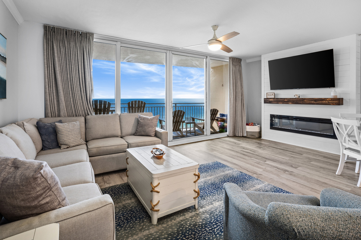 Spacious, sunlit living area with plush seating and breathtaking Gulf views. Step out onto your private balcony for coffee, cocktails, and endless ocean horizons. Your beachfront escape starts here!