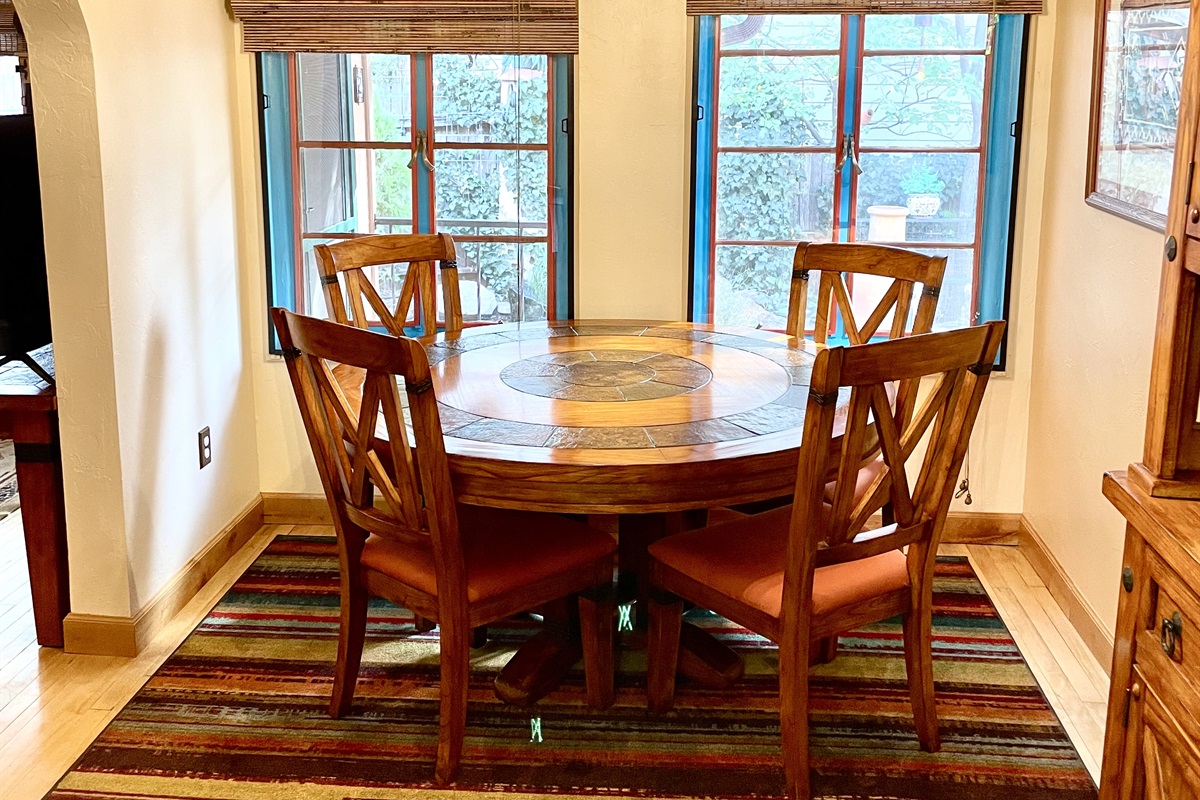 Gather around the table in this welcoming dining space.