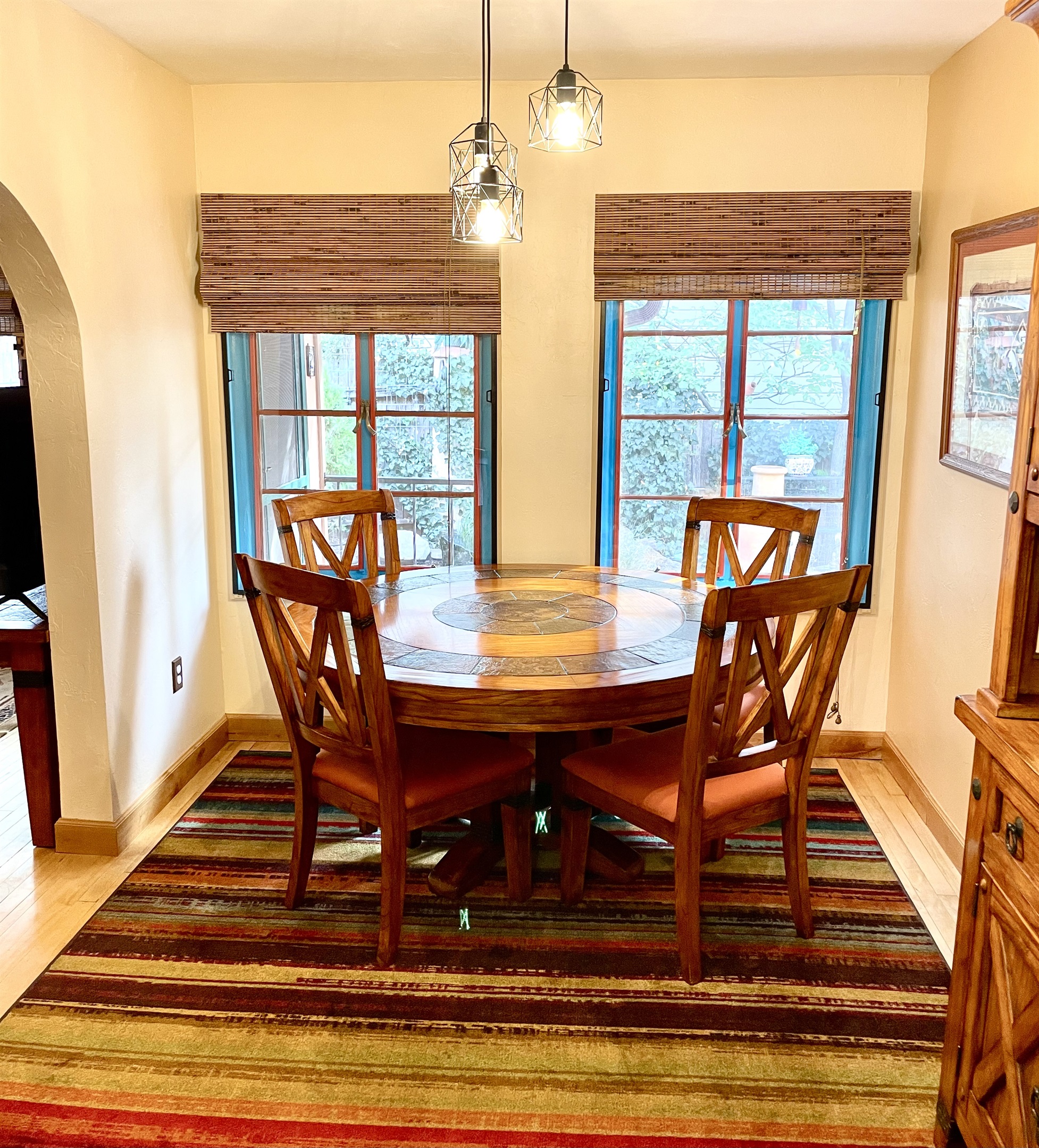 Gather around the table in this welcoming dining space.