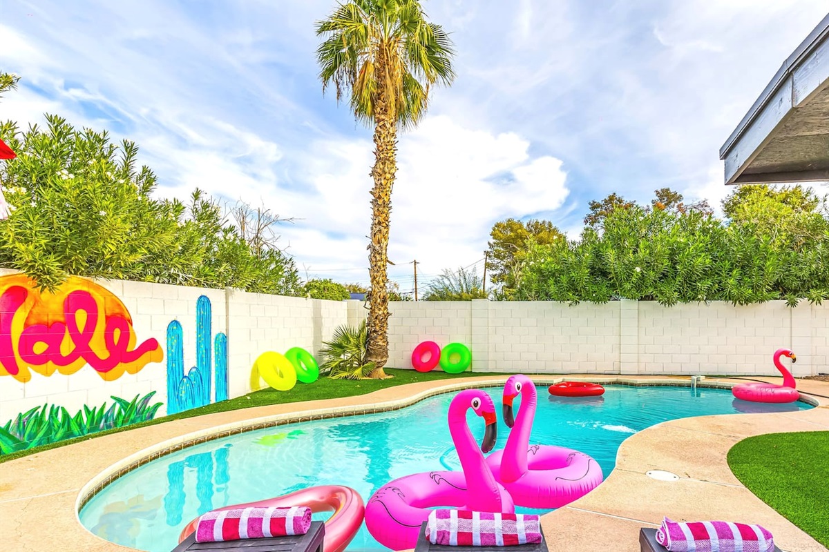 Palm trees, pool floats, and perfect weather—your backyard oasis awaits in the heart of Scottsdale.

