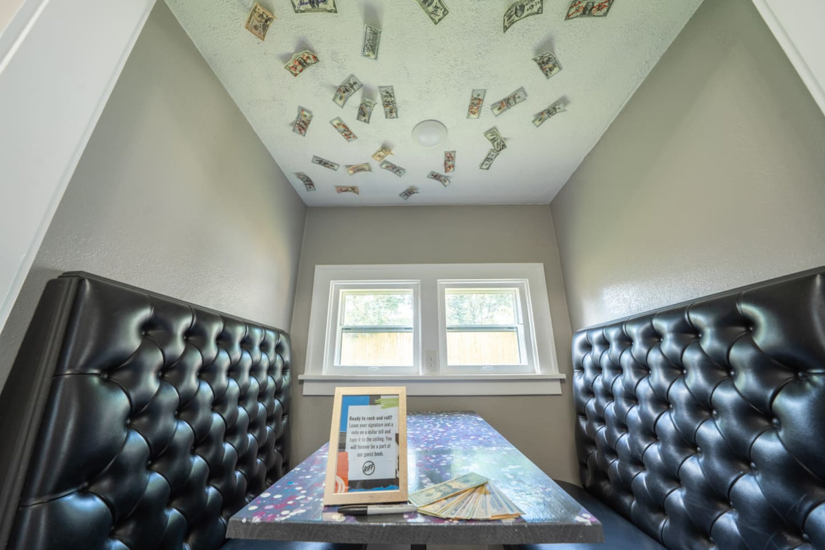 Leave your mark! Sign a note on a dollar bill and leave it on the ceiling just like you're at the bar!