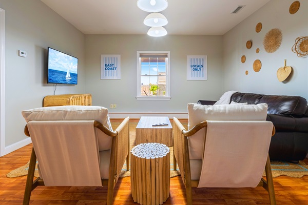 Whether you're here to watch a movie or just hang out, our basement living room is the perfect place to do it all.