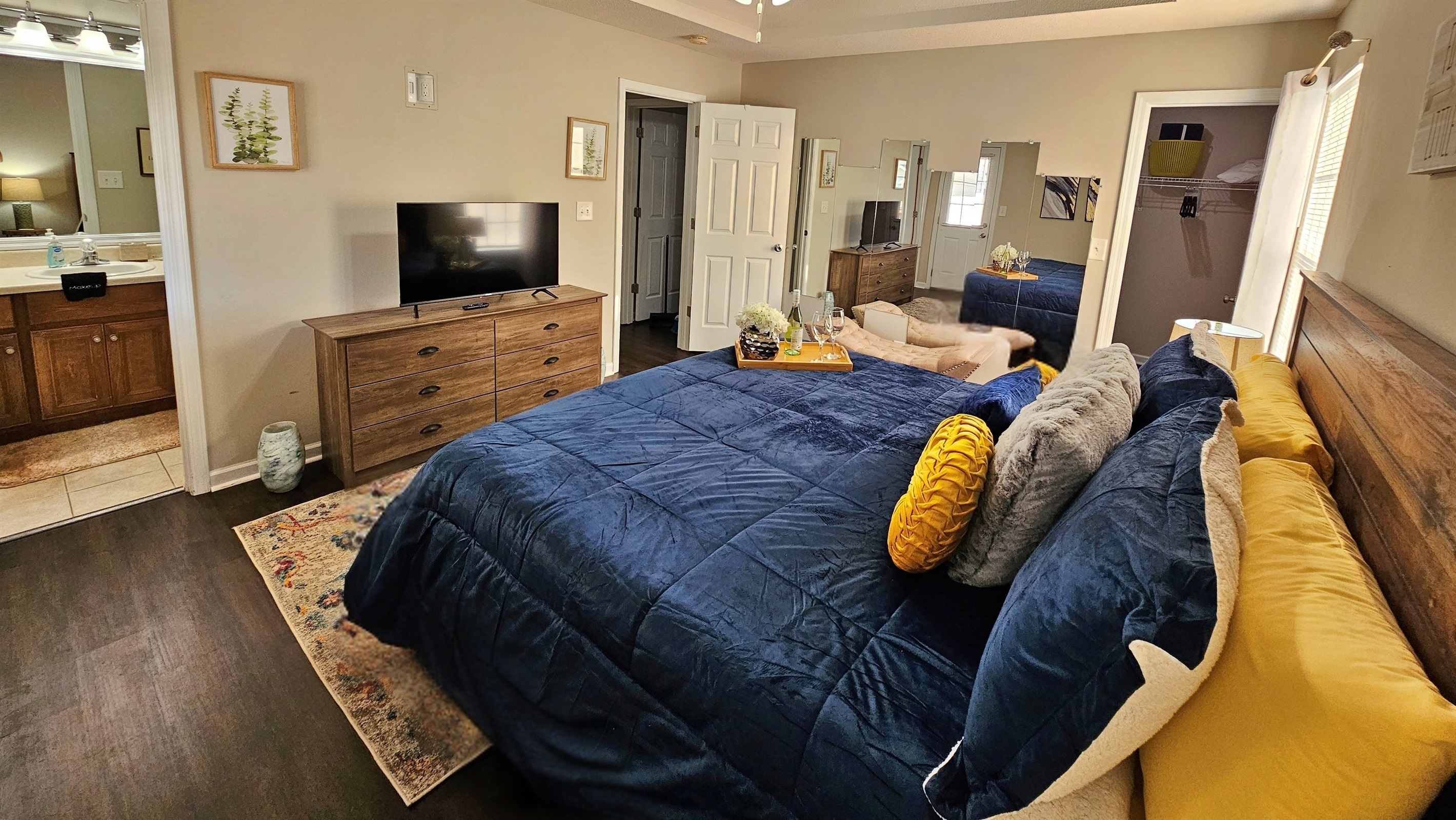 Enjoy the stunning mirror wall. Great for getting ready or just simply taking selfies.