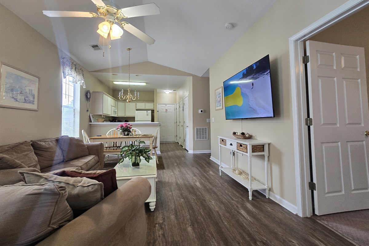 Spacious Open Floor Plan with Living Space and Dining Area