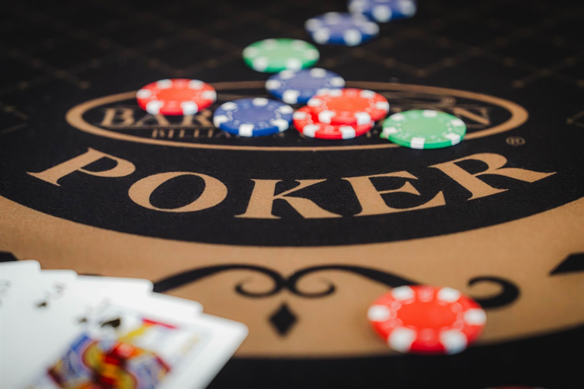 Challenge your friends to a round of poker at the custom game table.
