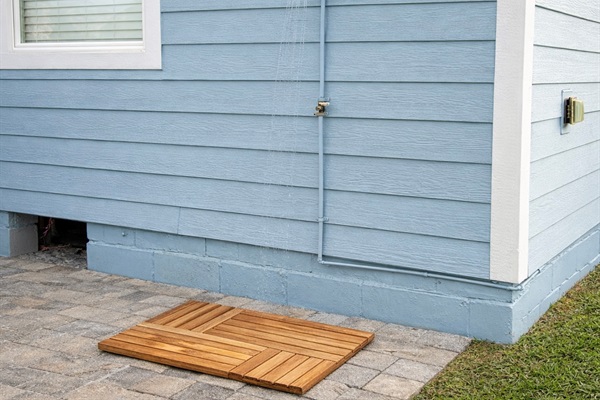 Outdoor rinse station after beach days.
