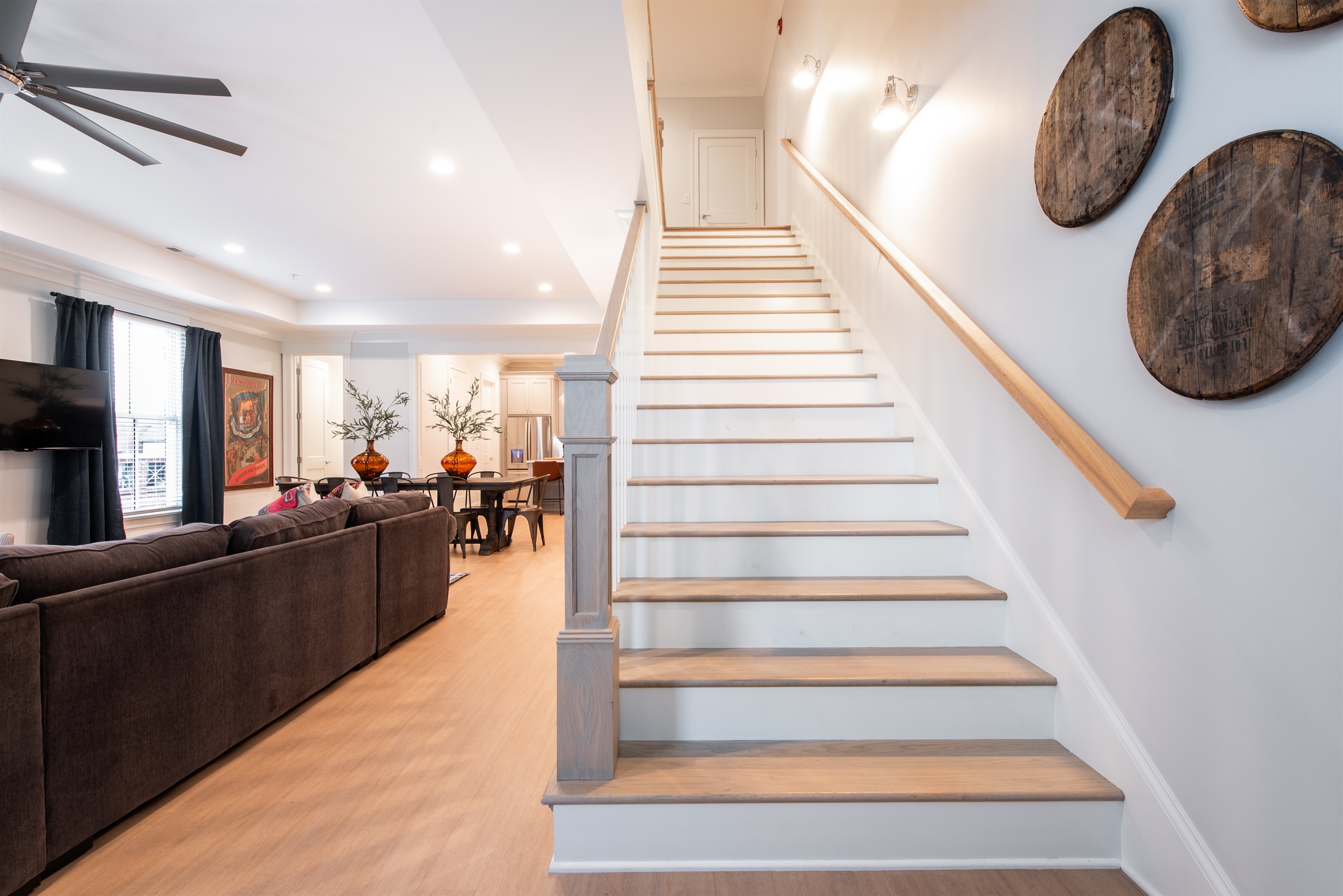 Pristine Airbnb in Louisville, KY with modern decor, spacious living area, and cozy ambiance.